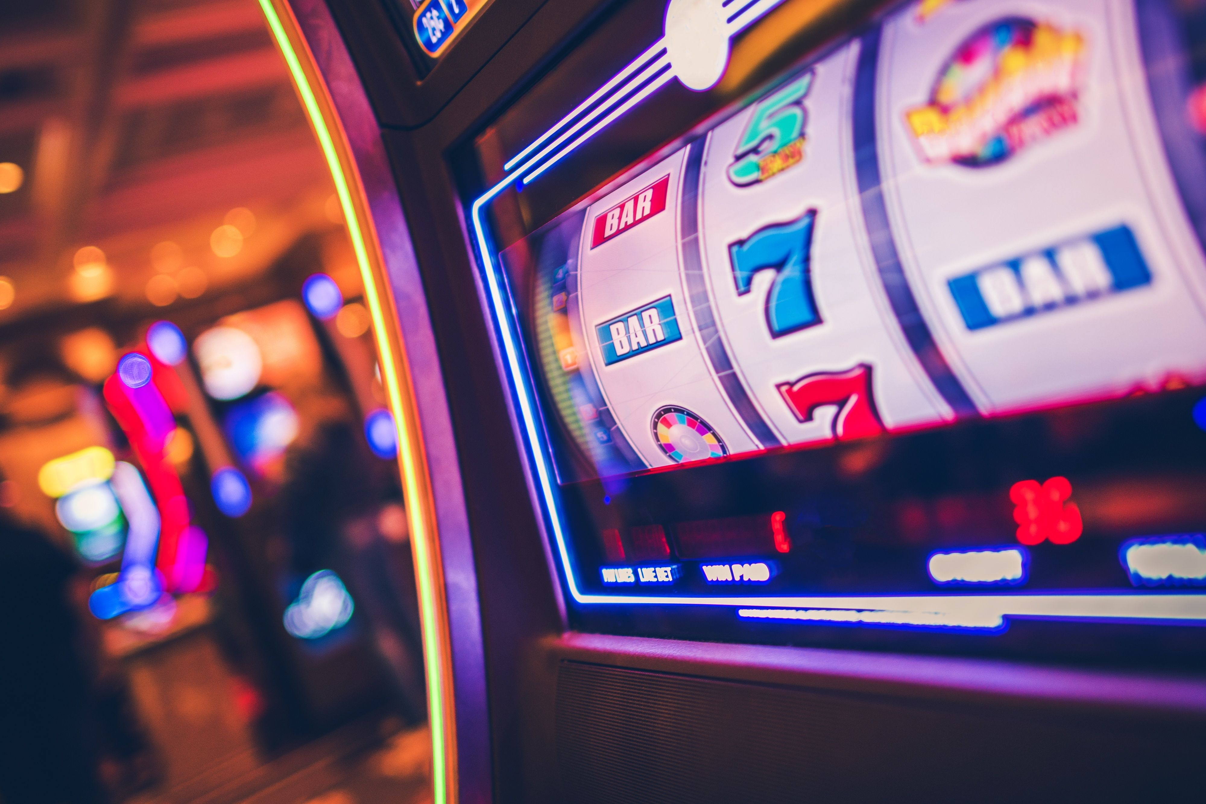 Live dealer revealing final card at okta Caribbean Stud table
